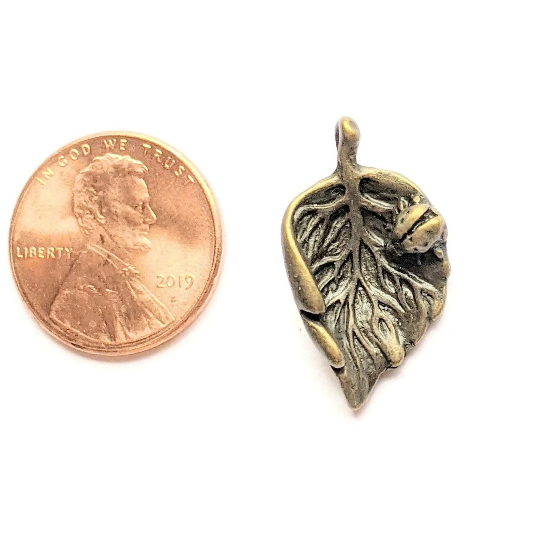 Antique Bronze Ladybug Leaf Charm