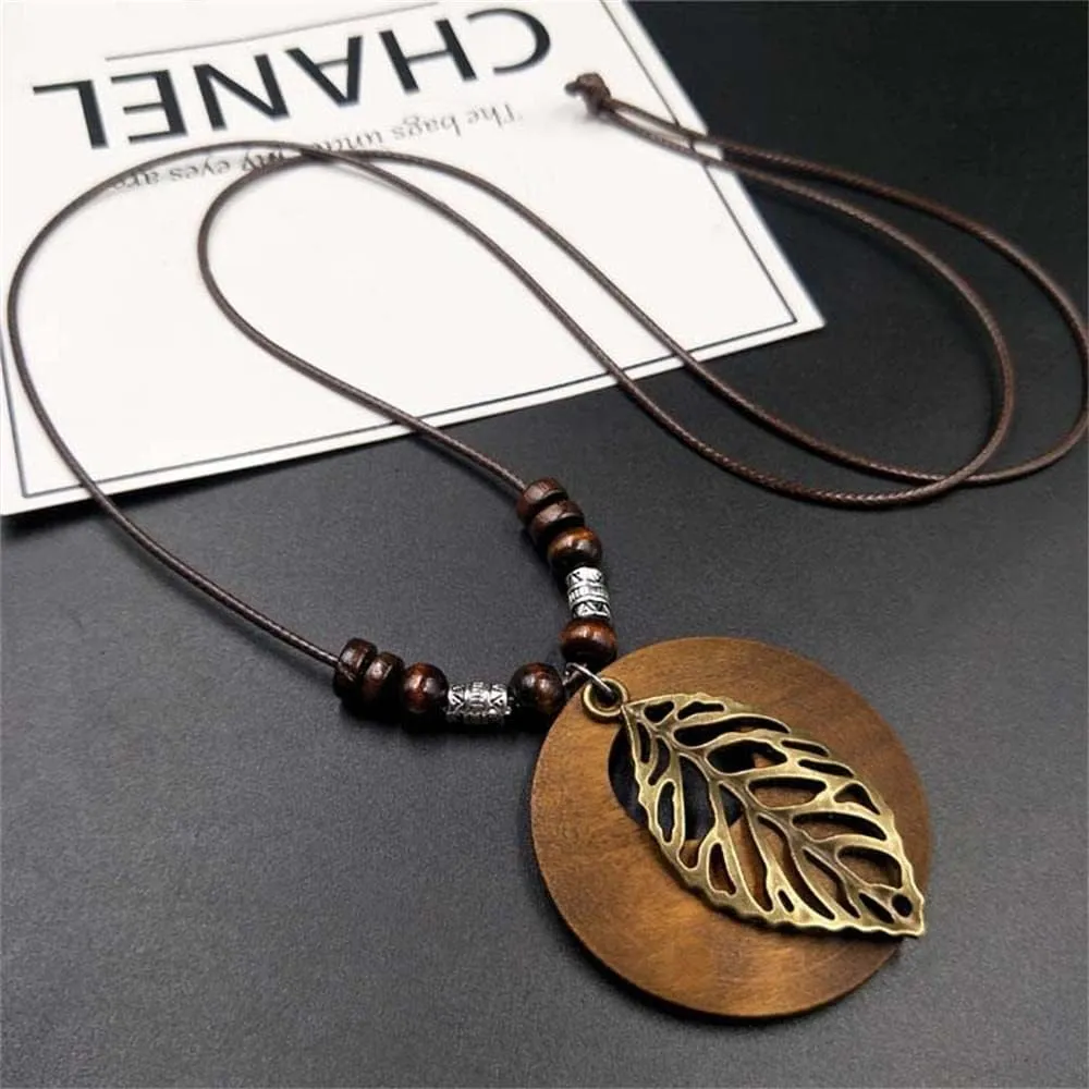 KIFEDSLJ Wooden Pendant Necklace with Owl Leaf Elephant Flower Handmade Vintage Bronze Leaf Long Leather Chain Sweater Necklace for Women